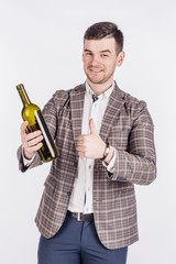 young man with a bottle of wine.