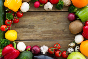 fresh fruits and vegetebles on wooden table for background.