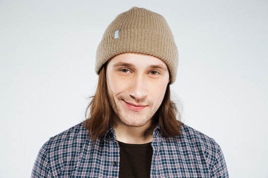 Young hipster in shirt and hat