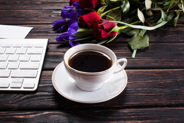 Fresh tulips on wood desk