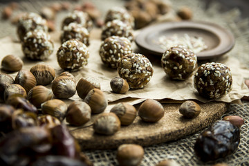Raw dumplings of dates and nut flour in the crooked and flaxseed