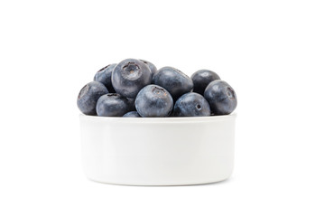 blueberry fruit in white cup isolated on white background