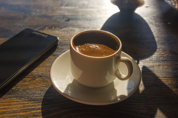 natural coffee with crema in Cup