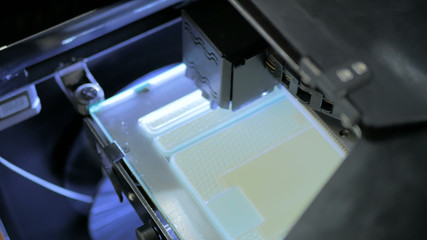 Three dimensional printing machine. 3D printer during work