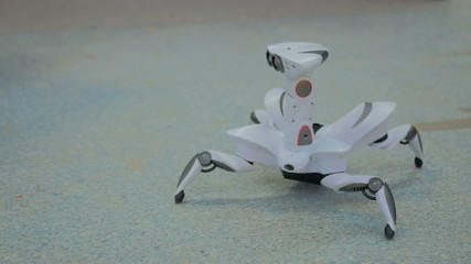 Futuristic robot spider dancing. Exhibition of modern technologies. Future and technology concept