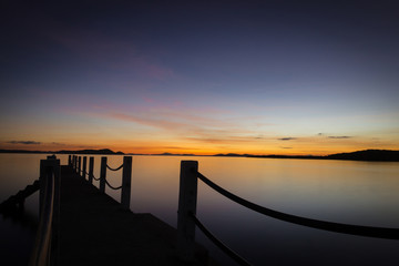 Fototapeta na wymiar Sunset on coron island, philippines, with a pier.