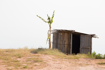 Rural toilet on hill.