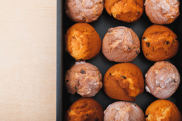 Muffins with raisins . Homemade cake with Icing Sugar