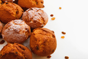 Muffins with raisins . Homemade cake with Icing Sugar