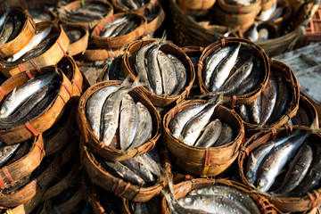 Mackerel fish in bamboo basket