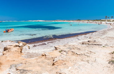 Beautiful rocky beach over crystal clear waters