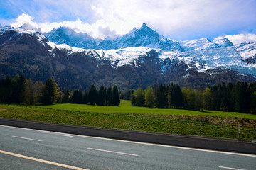 Fototapeta premium Mont Blanc Mountain covered with snow in spring. Amazing panorama with snow avalanche of French Alps in the spring.