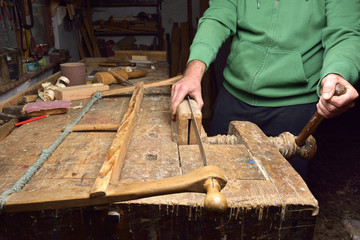 Carpenter working. Carpenter tools on wooden table with sawdust. Carpenter workplace