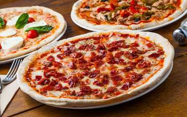 Italian pizza with dried Parma ham.