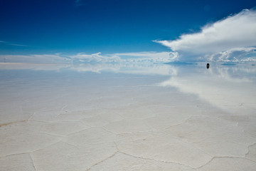 4x4 Tour Vehicle Driving on Flooded Salar de Uyuni