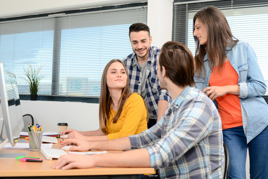 group of young cool hipster creative business people in casual wear working together in meeting room of a startup company