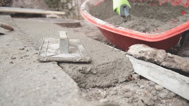 Renovating concrete pavement in home / budget DIY version.