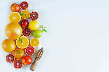 Citrus fruits on white background