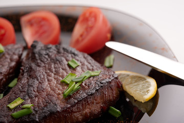 fried steak on a white background