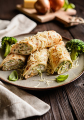 Broccoli pancakes with sour cream, cheese and onion