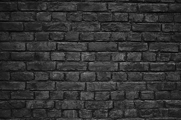 black brick wall, urban exterior weathered surface as background