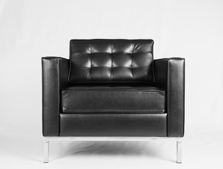 Studio shot of a grey modern sofa isolated on white background