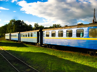 Fototapeta premium Antonovka-Zarechnoe narrow gauge railway. Passenger cars on the depot tracks. Ukraine