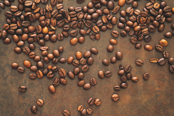 Coffee beans on stone table/coffee background
