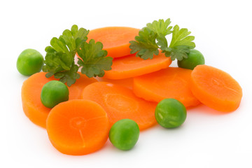 Carrot slice, green peas, isolated on white.