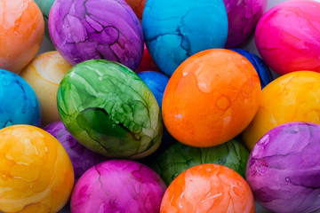 Easter eggs painted in colors on a white background.