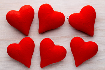 Red hearts the gray background. Valentine Day background.