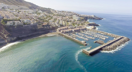 Aerial coastal view of port and small boats