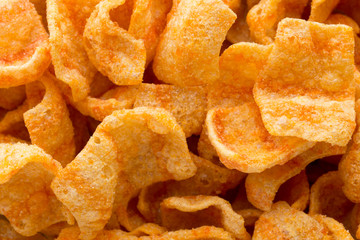 Delicious potato chips closeup becon meat.