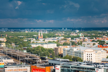 Riga, Latvia. Aerial Cityscape In Sunny Summer Day. Top View Of 