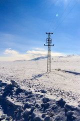 Winter Season Landscape and Power Lines