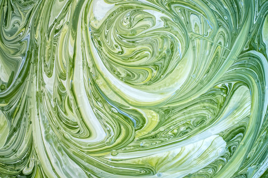 texture, mixing green paint closeup