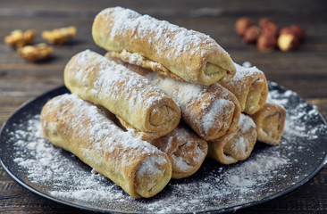 Puff rolls with nuts, raisins and cinnamon