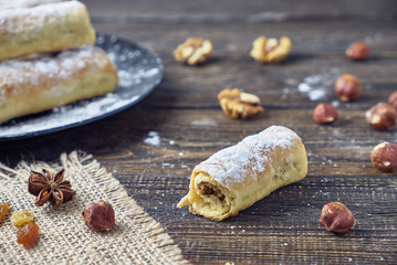 Puff rolls with nuts, raisins and cinnamon