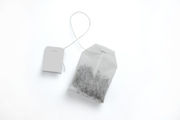 Teabag with grey label. Top view. Isolated on a white. mockup - Powered by Adobe
