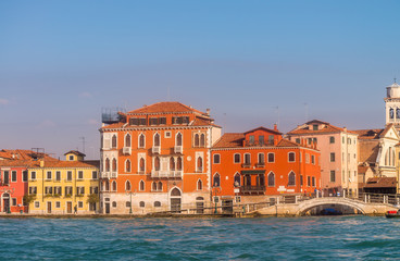 VENICE, ITALY - FEBRUARY 8, 2015: City architecture on a sunny day. Venice is a famous destination in Italy
