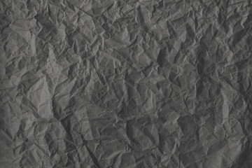 Crumpled paper background vignette. texture of crumpled paper.