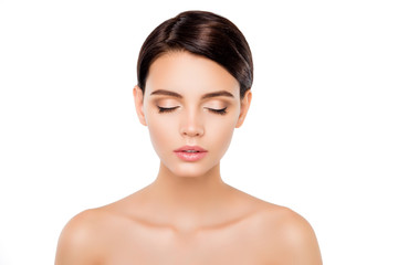 A portrait of attractive nude girl with closed eyes isolated on white background