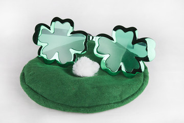 St Patrick's day hat and glasses isolated on white background.