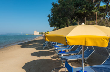 Rows of umbrellas and chairs on a beautiful beach