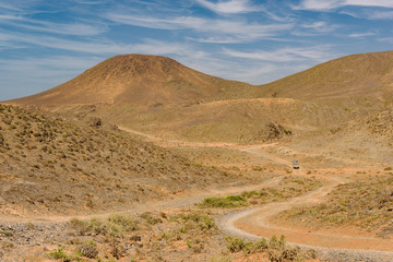 Car on a dirt road, Guelmim-Es Semara, Morocco