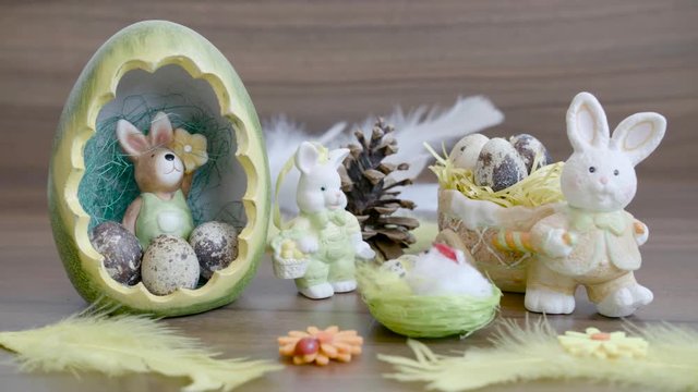 Easter decoration.Quail Easter eggs in baskets.Easter bunnies
