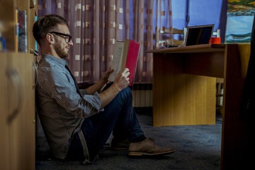 Student Working in Library at Night