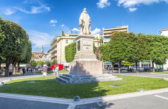 AREZZO, ITALY - MAY 2015: Guido Monaco Square with tourists. Arezzo is a small medieval city in Tuscany