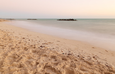 The Beach after Sunset at Fort Zachary Taylor Historic State Park, better known as Fort Taylor.  Key West, Florida. Photo shows the slow motion of water.