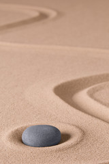 Fototapeta na wymiar Zen meditation stone and sand garden. Symbol for relaxing spirituality harmony and purity. Spiritual background...